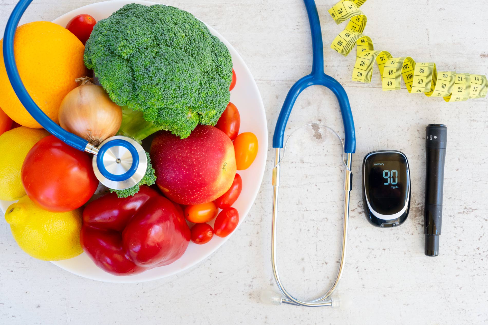 medical equipment next to fresh fruits and vegetables