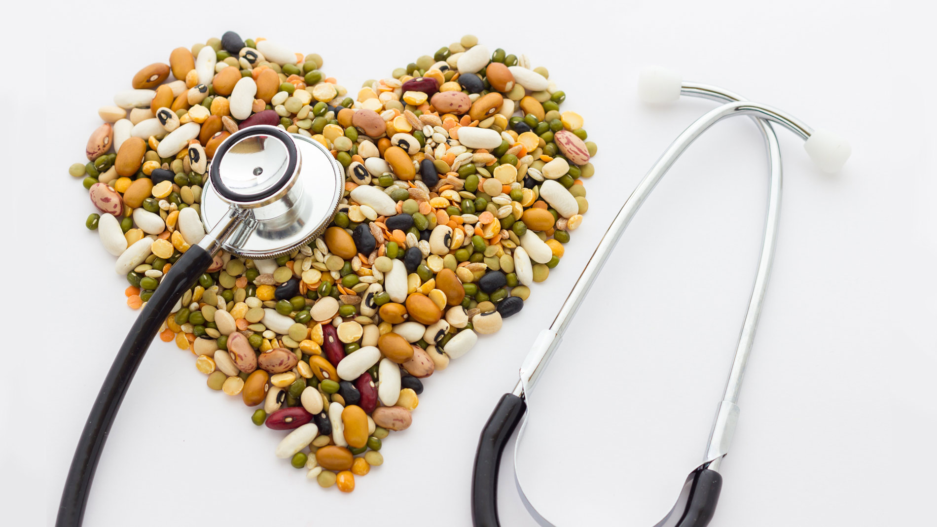 legumes shaped like a heart next to a stethoscope