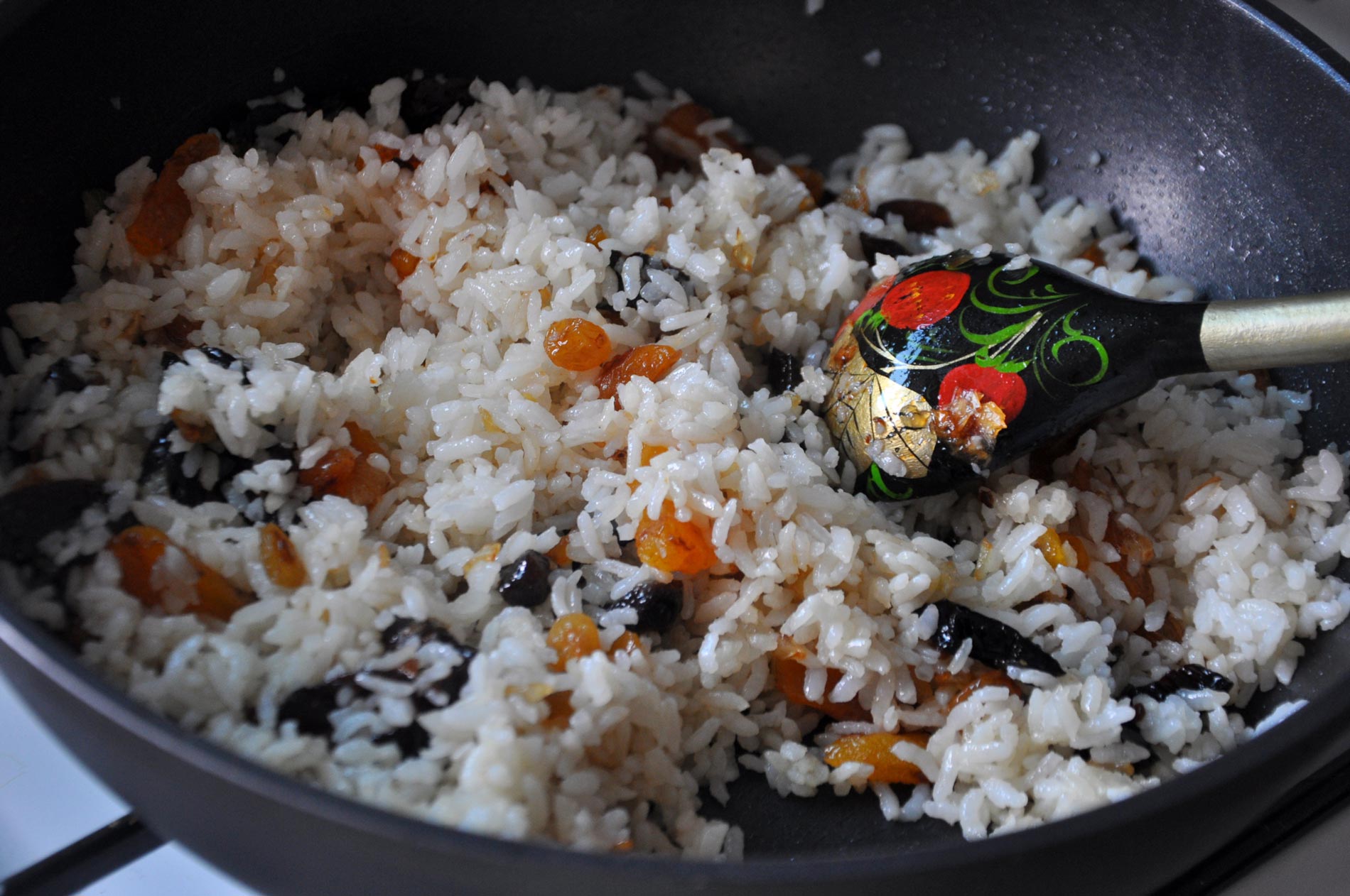 rice with dried fruits in a pan