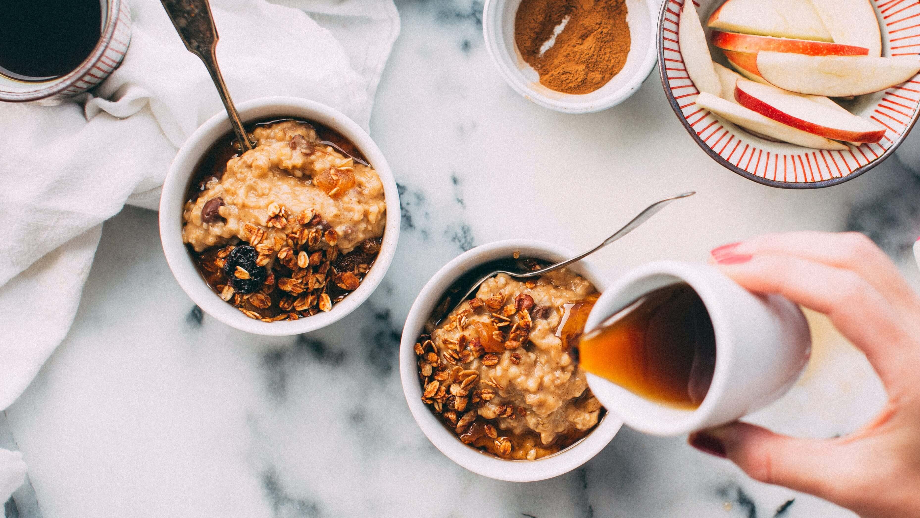 cooked oatmeal and maple syrup poured over