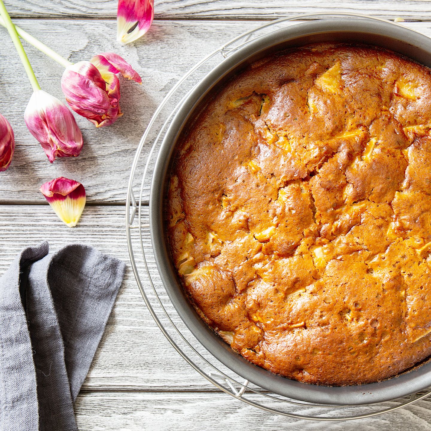 vegan apple cake in a round pan