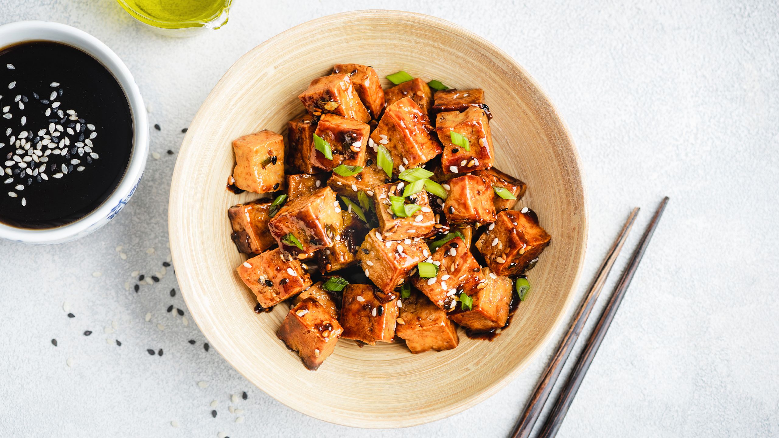 marinated tofu cubes in a bowl