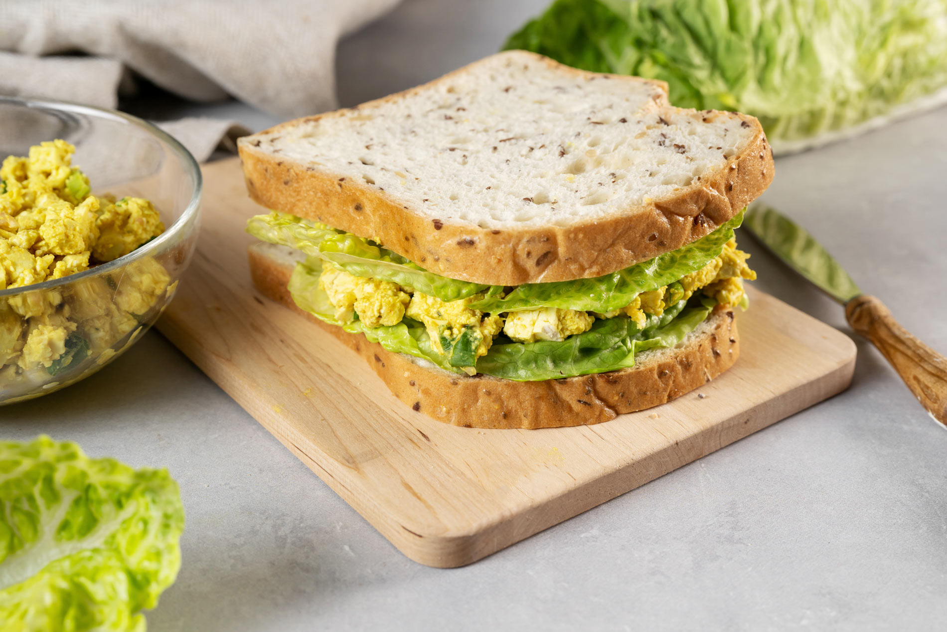 sandwich of vegan egg salad and lettuce