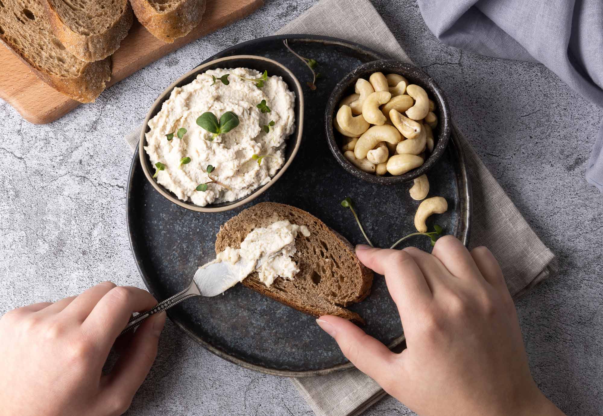 a slice of bread with cashew cheese