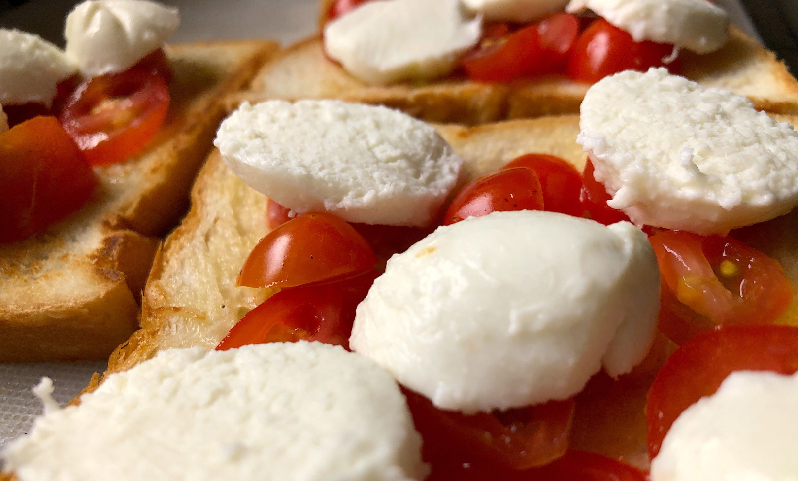 toast with cherry tomatoes and creamy cheese