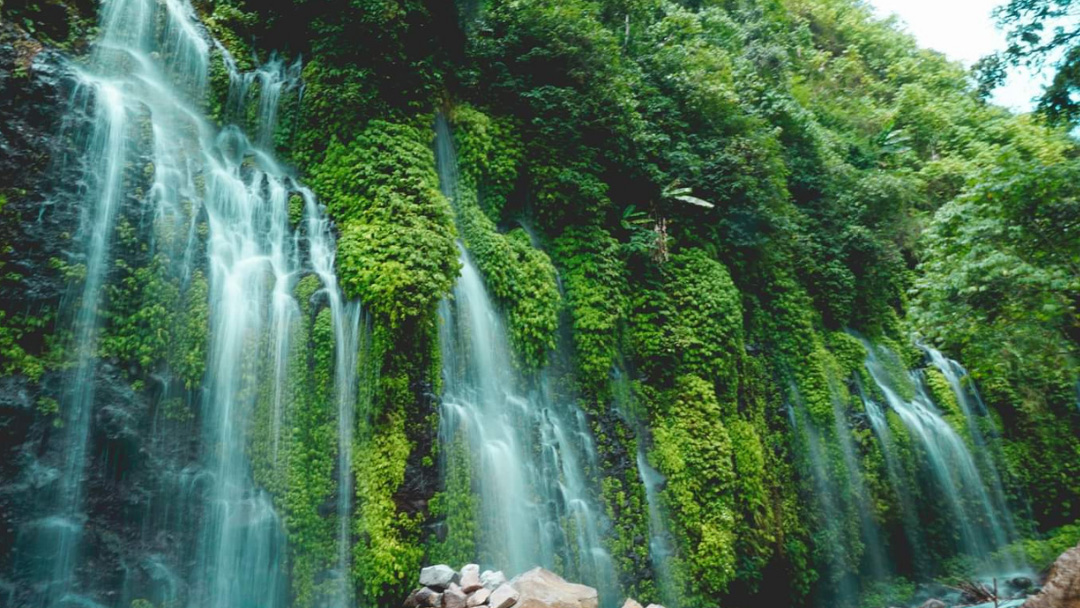 big natural waterfalls and greenery around them