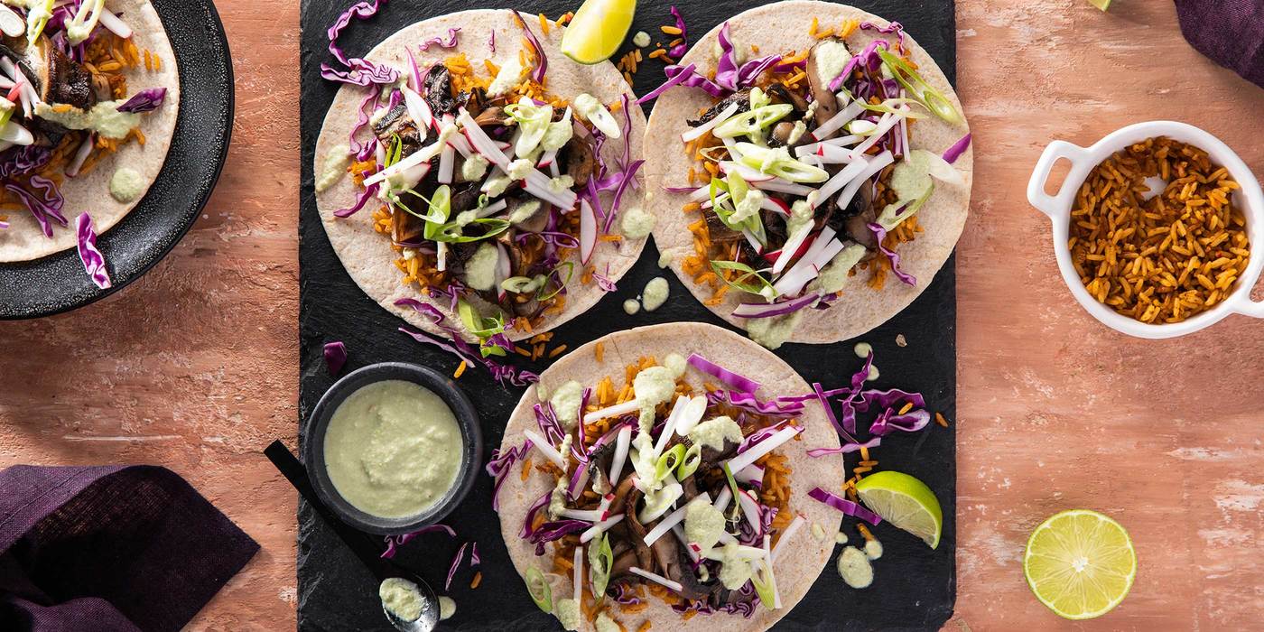 vegan open tacos with cheese sauce and portobello